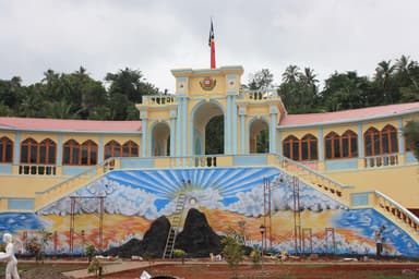 The restored colonial market building in Baucau with a painted mural