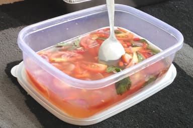 A fresh relish of chopped tomato, chilli and herbs in lime juice