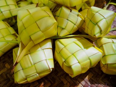 Woven palm-leaf rice parcels, the Indonesian ketupat, closely related to Timorese katupa