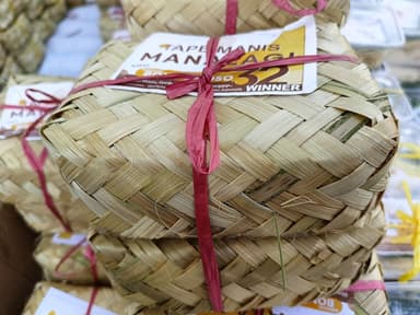 Woven bamboo baskets of fermented cassava tapai